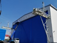 開口幅25m 開口高さ11m 中柱2本 可動式